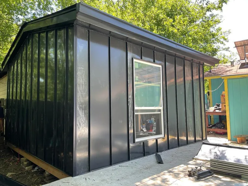 Black standing seam metal wall panels for Metal Roof Installation in Deer Park